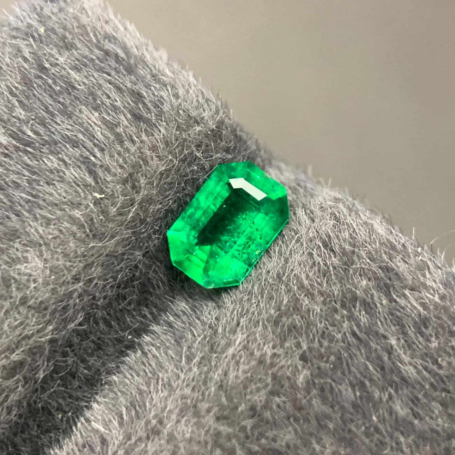 Swat Emerald 0.57ct Emerald Cut, natural green emerald from Swat Valley, Pakistan